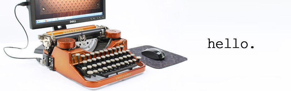 Beautiful Gold USB Typewriter plugged into desktop computer
